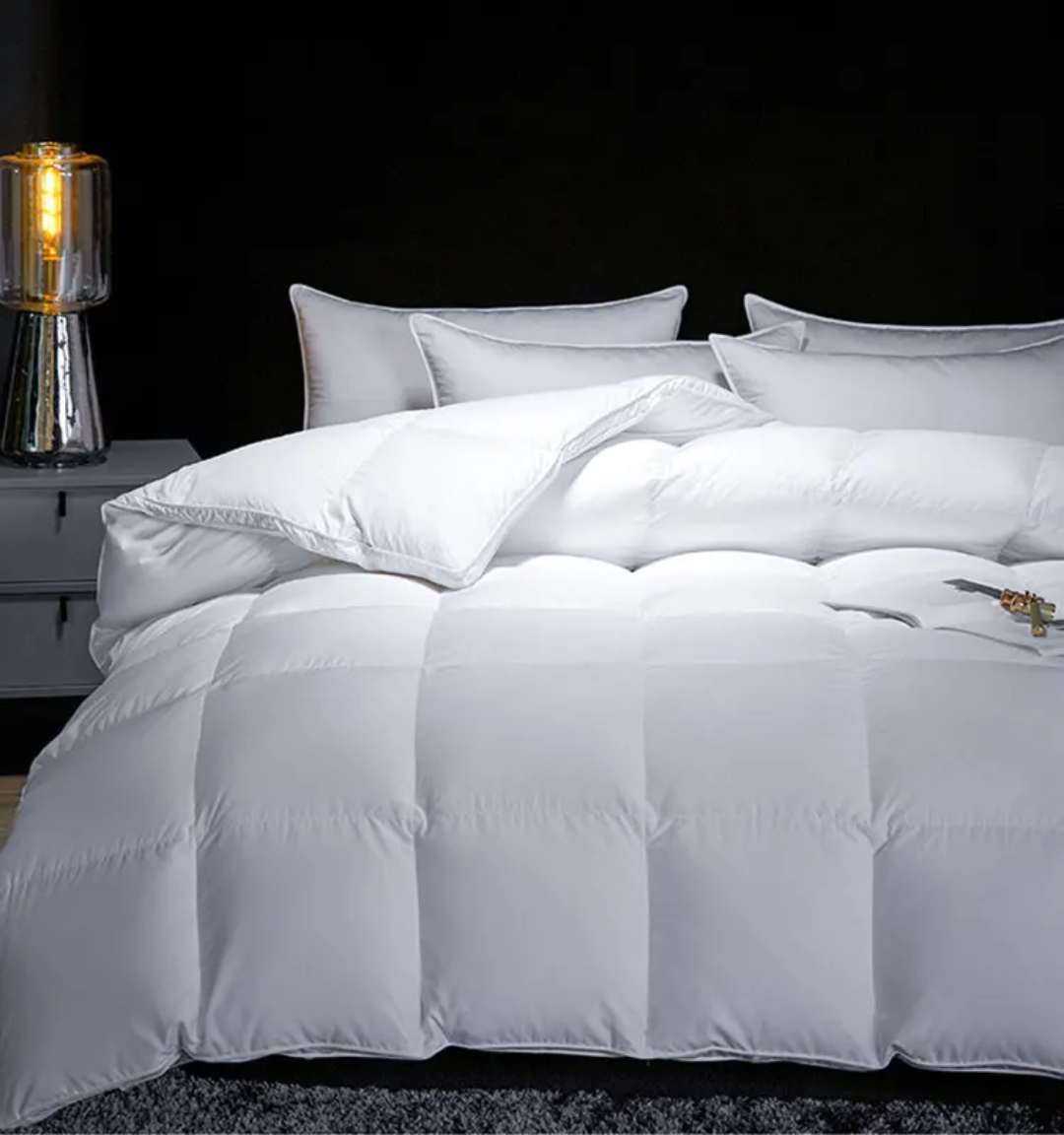 Couette avec deux oreillers déjà remplis